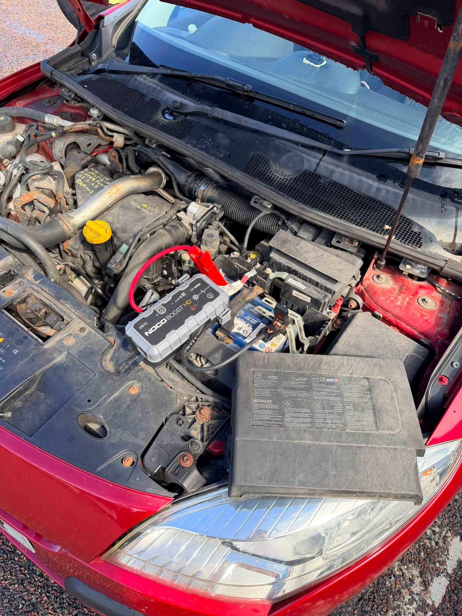 Portable booster connected during a genuine DSBM flat-battery jump-start callout
